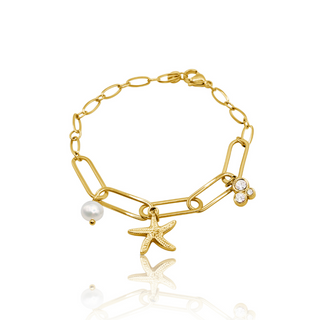 Gold bracelet with starfish, pearl, and diamond charm 
