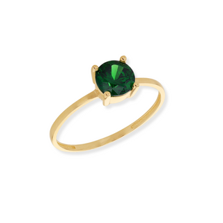Gold ring with a green gemstone 