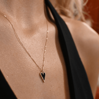 BLACK ONYX AND CUBIC ZIRCONIA HEART PENDANT
